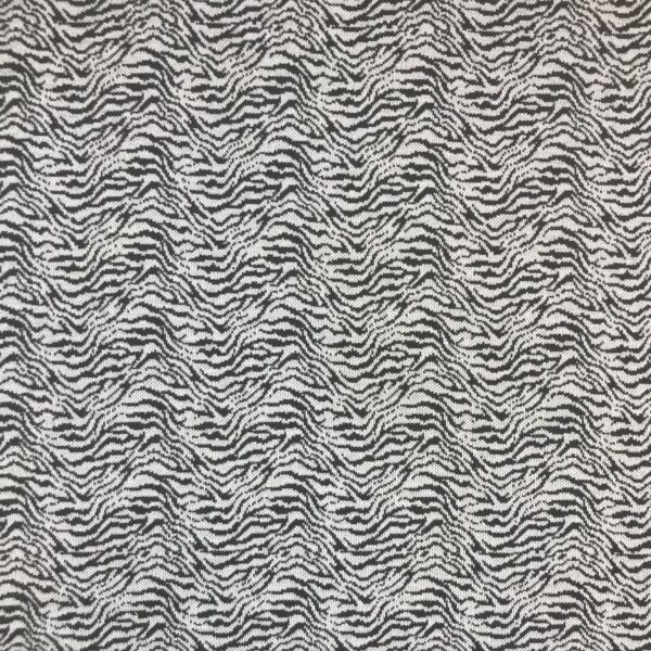 Kraftig bomuldsjersey med zebramønster i grå.