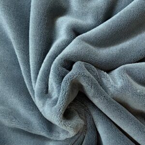 Dobbeltsidet polyester fleece i støvet blå